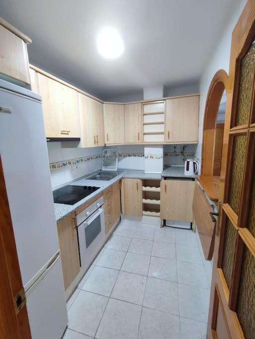 Apartamento En Playa Carvajal ฟูเอนฮิโรลา ภายนอก รูปภาพ