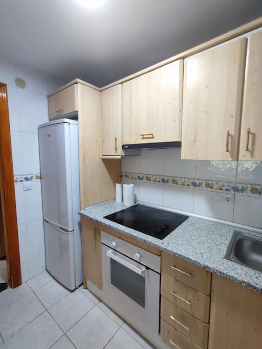 Apartamento En Playa Carvajal ฟูเอนฮิโรลา ภายนอก รูปภาพ